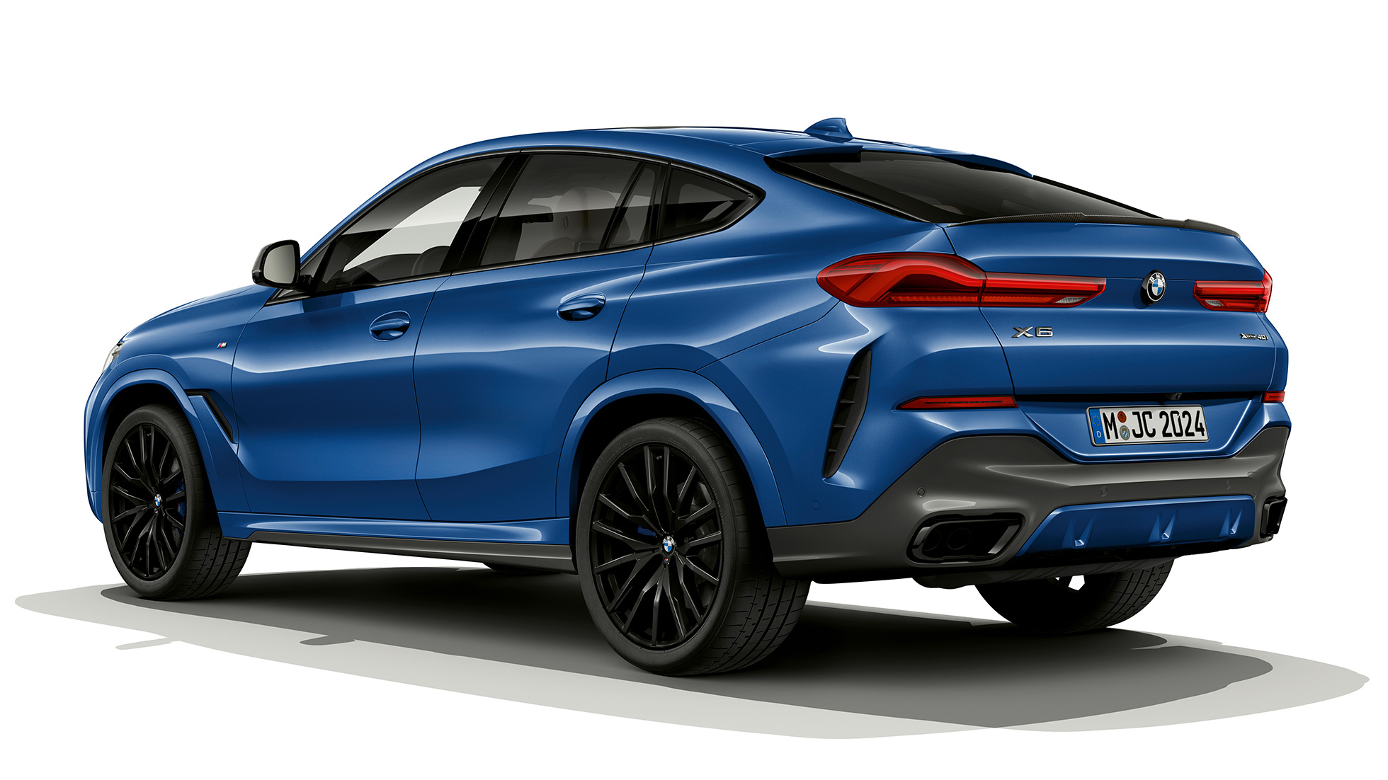 BMW X6 with M Sport package, rear. BMW X6 with M Sport package in three-quarter rear perspective.