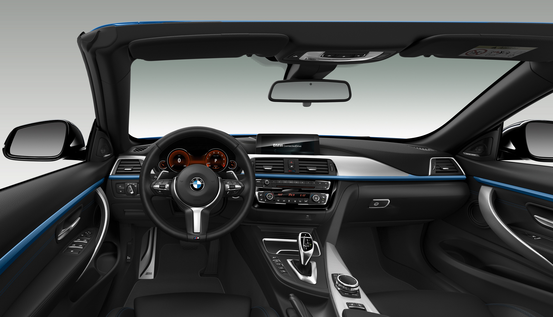 BMW 3 Series Sedan, driving side view. Driving shot of the BMW 3 Series Sedan from the side on the day in an urban setting.