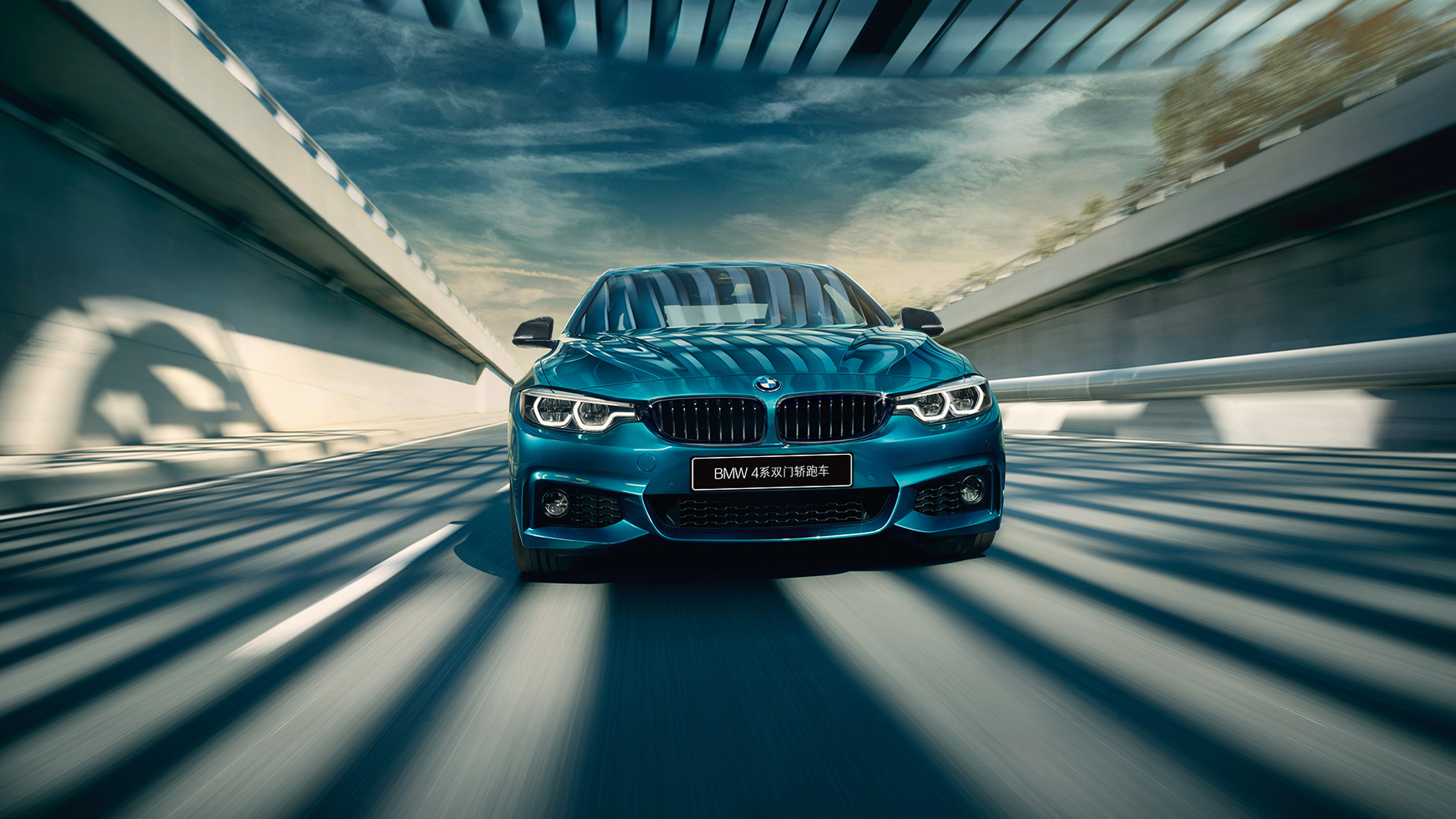 BMW 3 Series Sedan, driving side view. Driving shot of the BMW 3 Series Sedan from the side on the day in an urban setting.