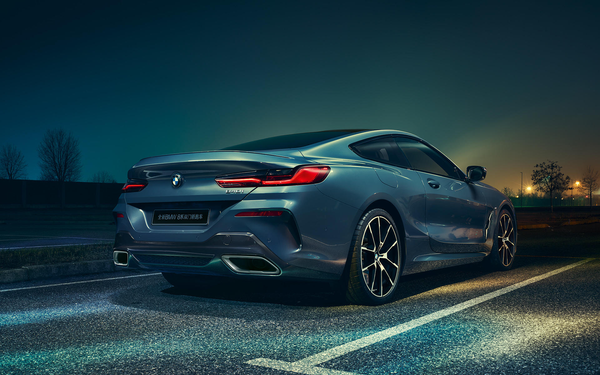 BMW 8 Series Coupé, left Left-side shot of the BMW 8 Series Coupé in an urban setting.