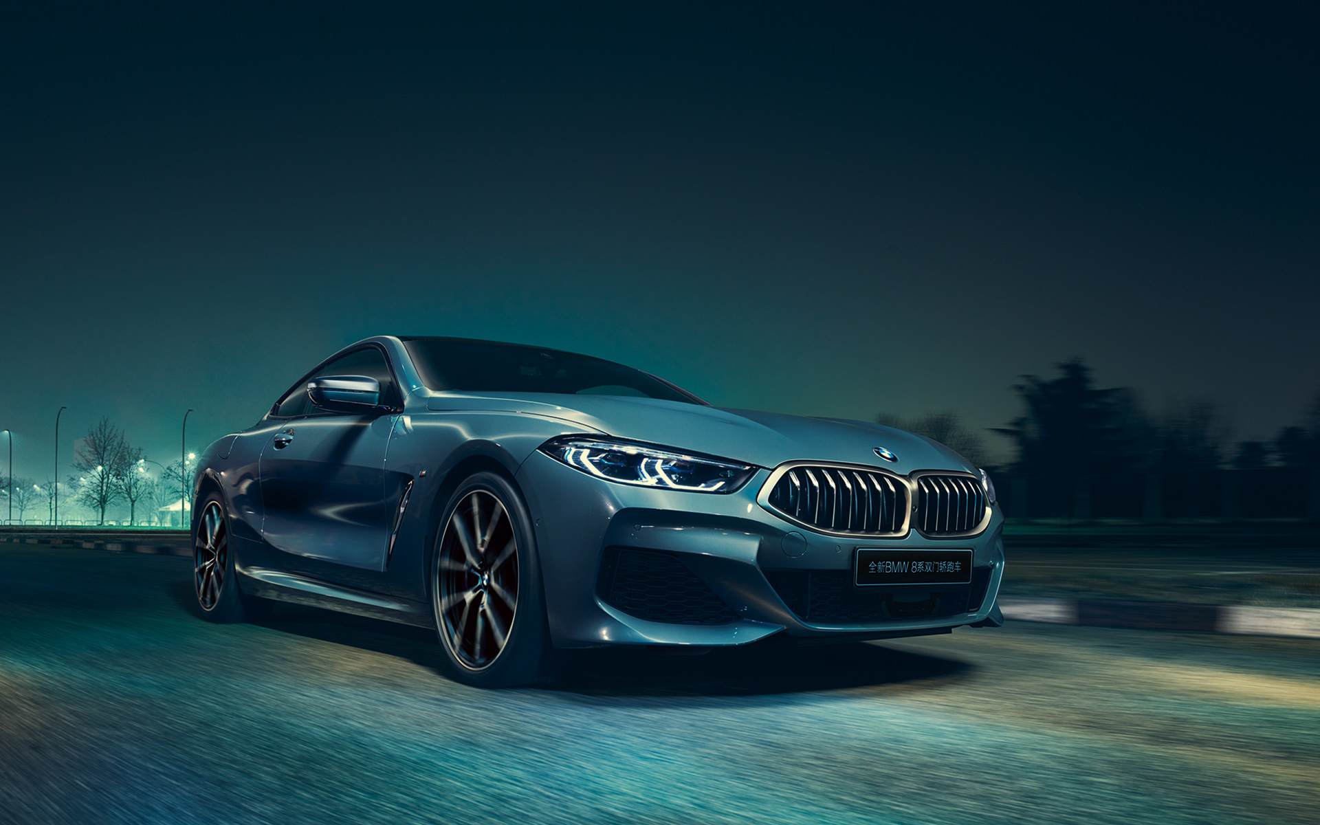 BMW 8 Series Coupé, three-quarter back A three-quarter back-left still shot of the BMW 8 Series Coupé in an urban setting.
