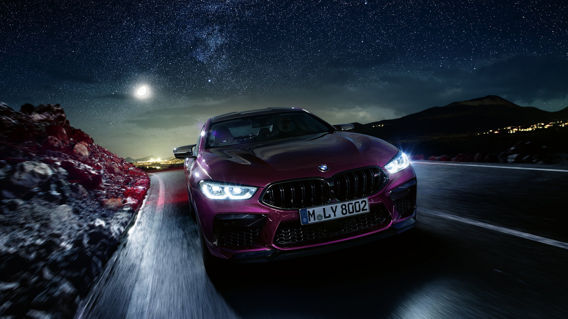 BMW M8 Competition Coupé. The first-ever BMW M8 Competition Coupé in Marina Bay Blue metallic, three-quarter front view.